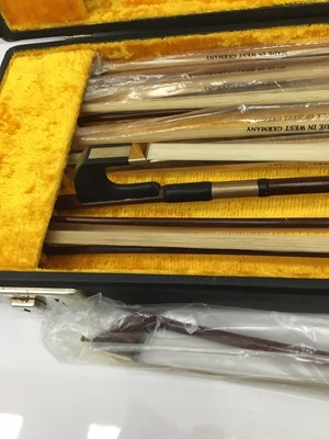 Lot 118 - Collection of violin and cello bows, various makes, appear to be inunused condition, within fabric lined case
