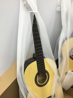 Lot 124 - Four Spanish acoustic guitars, all in un-usued condition, in card cases
