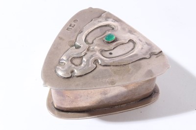 Lot 164 - Edwardian Arts & Crafts silver trinket box of triangular form with hinged cover set with green semi precious stone, (Birmingham 1902), maker William Hutton & Sons, all at approximately 3oz, 6.5cm i...