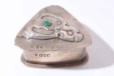 Lot 164 - Edwardian Arts & Crafts silver trinket box of triangular form with hinged cover set with green semi precious stone, (Birmingham 1902), maker William Hutton & Sons, all at approximately 3oz, 6.5cm i...