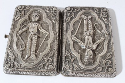 Lot 170 - Pair of white metal dishes set with coins together with an Indian white metal cigarette case, an Indian white metal table top snuff / tobacco box and two white metal cups (6 items)