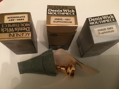 Lot 134 - Three Denis Wick euphonium mouthpieces, including 6BY (2), SM2, all boxed and as new