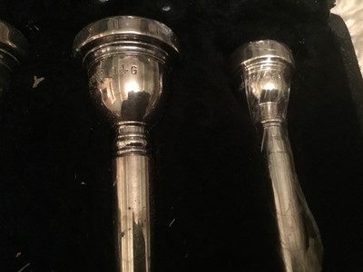 Lot 138 - Sample case of Vincent Bach Corp mouthpieces, various sizes, trumpet and cornet, horn and tuba family, 19 in total, in travelling case, unused condition, some in original wrapping