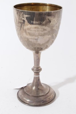 Lot 195 - Edwardian silver trophy cup / goblet of conventional form with engraved foliate decoration and presentation inscription ''From the Clarendon Division Jamaica Constabulary to Inspector Mc Crea 1892...