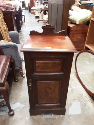 Lot 1088 - Edwardian walnut pot cupboard, 41cm wide, 86cm high, 37cm deep,  and a mahogany framed oval bevelled wall mirror