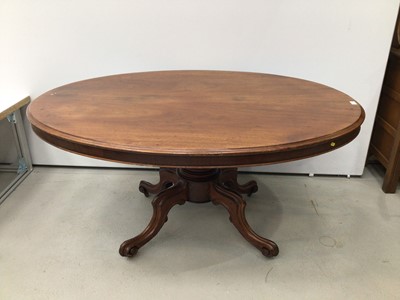 Lot 132 - Victorian mahogany breakfast table with oval tilt top on turned column with four spayed legs