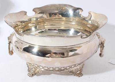 Lot 203 - George V silver monteith of cauldron form with beaded border, twin Lion mask ring handles, on pierced circular foot with scroll and paw feet, (Sheffield 1927), maker William Hutton & Sons, all at a...