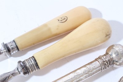 Lot 179 - Two 19th century silver plated Stilton scoops with turned Ivory handles, together with another two with silver plated handles (4)