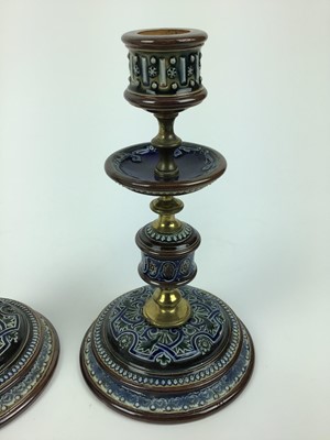 Lot 74 - Pair of Doulton Lambeth candlesticks, impressed marks to base, 20.5cm high
