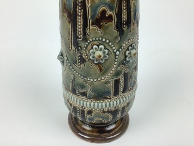 Lot 76 - Unusual Doulton Lambeth bottle and stopper with applied floral and beaded decoration, possibly George Tinworth, impressed marks to base, 21cm high