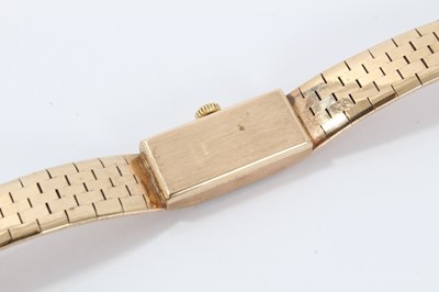 Lot 132 - Lady's 9ct gold Roamer wristwatch on integral gold bracelet