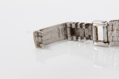 Lot 134 - Lady's Tissot 9ct white gold wristwatch on integral bracelet