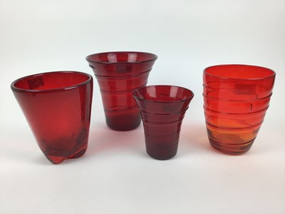 Lot 86 - Three Whitefriars Ruby red ribbon trailed vases, 19cm, 18cm and 14cm