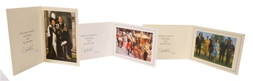 Lot 91 - HM Queen Elizabeth II - three signed Christmas...