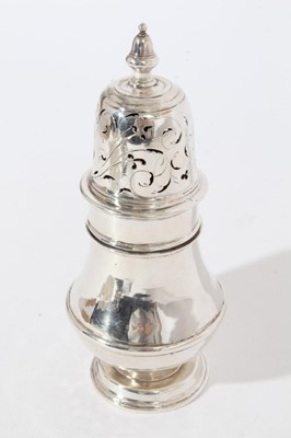 Lot 243 - Queen Anne silver caster of baluster form, body with engraved letter 'M', pierced push fit cover with acorn finial, on a circular foot (Edinburgh 1707), maker Walter Scott, label from Tessiers Ltd,...