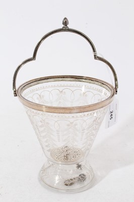 Lot 245 - Late Victorian glass ice bucket of inverted bell form, with etched Fern leaf decoration and silver plated mounts, 14cm in height excluding handle