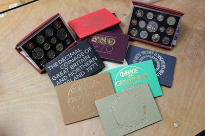 Lot 475 - G.B. - The Royal Mint issued proof sets to include 1970 x4, 1971, 1972, 1973, 1974, 1975, 1975, 1976 and in the red deluxe leather cases 1996, 2004 and 2005 (13 coin sets)