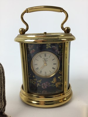 Lot 116 - Halcyon Days miniature enamel carriage clock with floral and butterfly decorations, 6.5cm high, plus two other miniature clocks