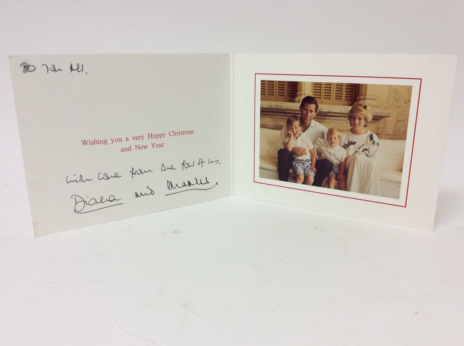 Lot 99 - T.R.H. The Prince and Princess of Wales signed 1987 Christmas card inscribed ' To you all, with love from the four of us Diana and Charles '