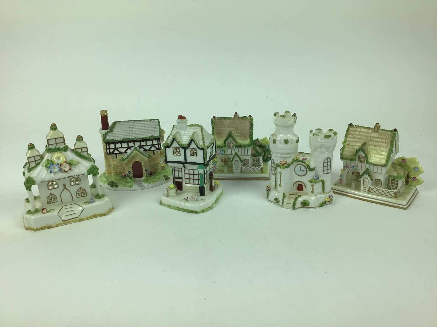 Lot 125 - Collection of twelve Coalport cottages - Village Church, The Gate House, Two Chimneys, Park Lodge, The Master's House, The Parosol House, Elizabethan Cottage, The Old Curiosity Shop, The Bermuda Co...