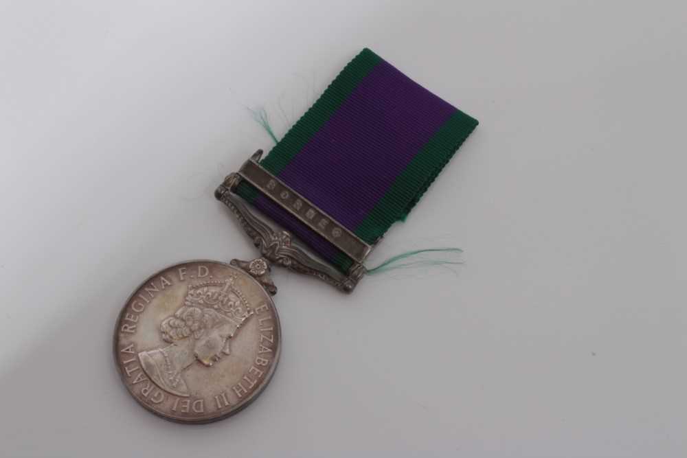 Lot 240 - Elizabeth II Post 1962 type General Service medal with one clasp- Borneo, named to R M. 15505 J.F. Dunbar. MNE. R.M.