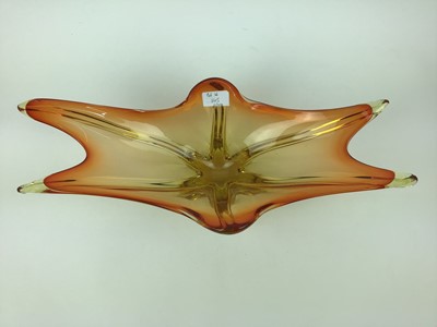 Lot 145 - Four pieces of Czech glass including orange and clear bowl, 39cm wide, orange and amber dish, 47.5cm wide, red and amber dish, 46.5cm wide and amber and red bowl, 25cm