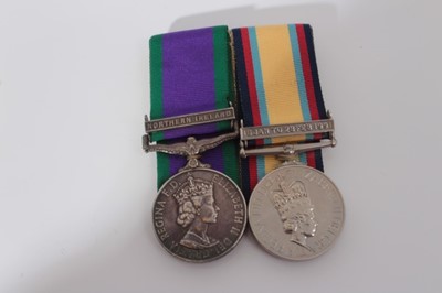 Lot 246 - Elizabeth II medal pair comprising 1962 type General Service medal with one clasp- Northern Ireland named to 24675044 GNR. A. Purvis R.A. together with a Gulf medal with 6 Jan to 28 Feb 1991 clasp,...