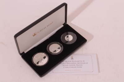 Lot 505 - Tristan Da Cunha - The Jubilee Mint issued silver proof Three coin set to include £1, £2 and £5 commemorating Queen Elizabeth II Longest Reigning Monarch 2015 (in case of issue with Certificate of...