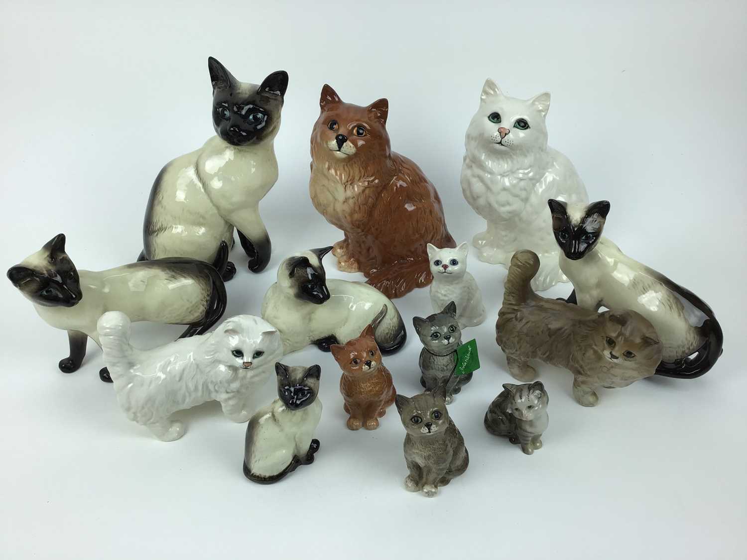 Lot 195 - Fourteen Beswick cats