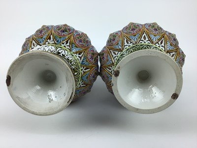 Lot 194 - Pair of 20th century twin handled vases, possibly by zsolnay pec impressed marks to base number 1202, 38cm high