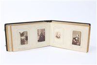 Lot 113 - A Victorian photograph album containing carte...