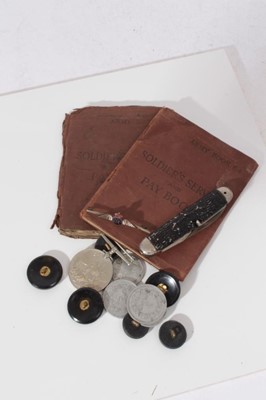 Lot 288 - Two Second World War Army Soldiers Service and Pay Books together with a Second World War War medal and other military buttons and militaria