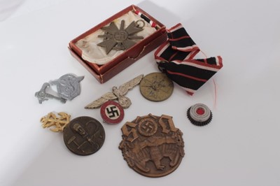 Lot 284 - Second World War Nazi German War merit cross (with swords) together with other replica Nazi German awards and badges