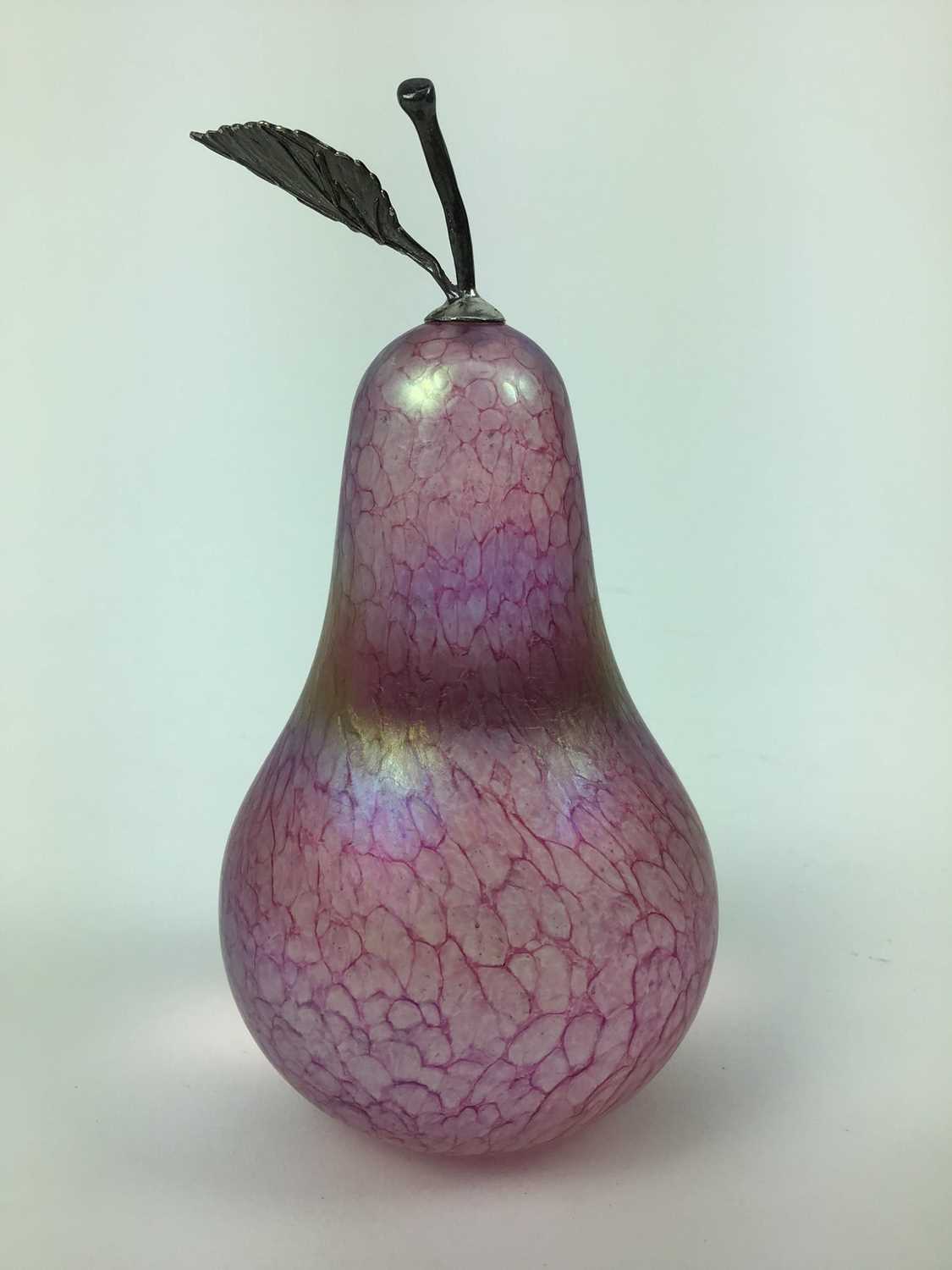 Lot 155 - John Ditchfield Glasform iridescent pink pear paperweight with silver leaf and stork, signed 13cm high