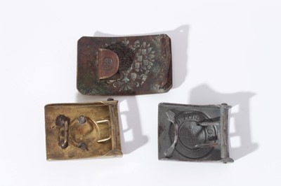 Lot 269 - Two First World War Imperial German belt buckles together with an Imperial Russian belt buckle (3)