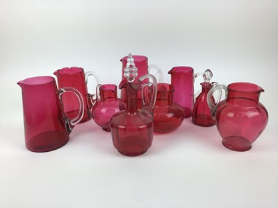 Lot 176 - Selection of Victorian cranberry glass jugs and a decanter