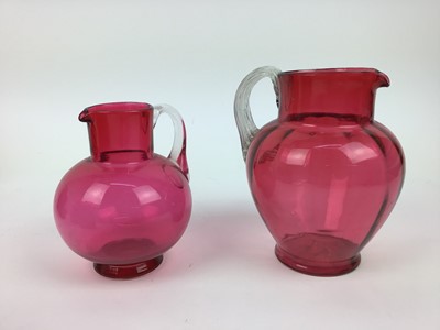 Lot 176 - Selection of Victorian cranberry glass jugs and a decanter