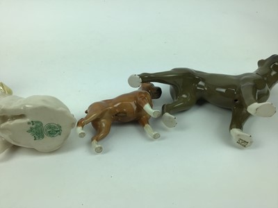 Lot 206 - Belleek model of a pig and seven various dog ornaments including Royal Doulton and Beswick
