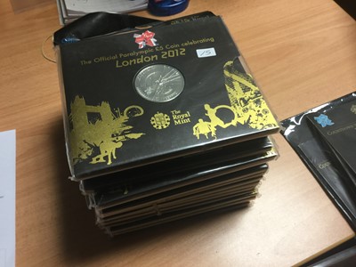 Lot 605 - G.B. - The Royal Mint issued The London 2012 official Paralympic £5 coins in presentation folders rev: a design showing segments of a target, a spoked wheel etc x17 (ref: Spink 4925) scarce, comple...