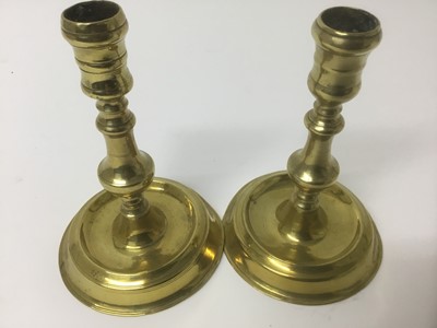 Lot 65 - Near pair of early 18th century brass candlesticks