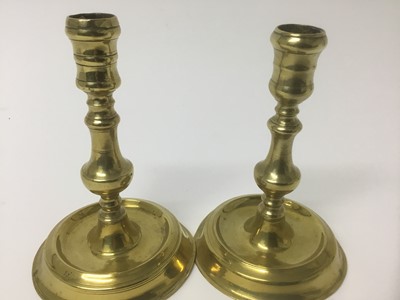 Lot 65 - Near pair of early 18th century brass candlesticks