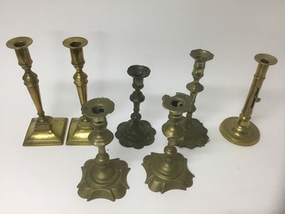 Lot 229 - Pair of George I / II brass candlesticks, together with two similar sticks and two later