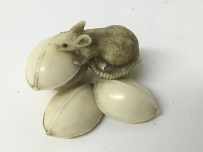 Lot 73 - Japanese carved ivory okimino of a rat on a pile of nuts, together with a Japanese shibyama bead and two animal groups