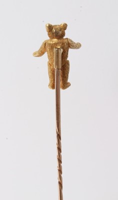 Lot 96 - Rare early 20th century gold teddy bear stickpin, the bear with long limbs and beautifully detailed with spiral twist pin fitting - probably a special commission .