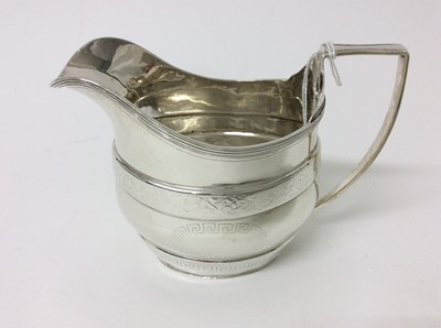 Lot 174 - Edwardian silver helmet-shaped cream jug in the Georgian style, with engraved Greek key and foliate borders (Chester 1903), 4.4ozs