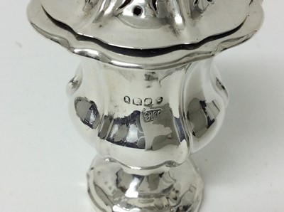 Lot 175 - Good quality William IV silver pepperette, of shaped campagna form, pierced cover and shaped pedestal foot, (London 1831), makers mark indistinct, 9cm high, 2ozs
