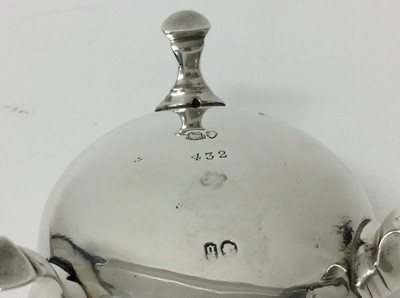 Lot 177 - Victorian silver cauldron salt with beaded border, on three hoof feet (London 1871), together with a Victorian silver beaded salt spoon (London 1869), all at 2.7ozs