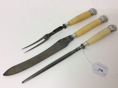Lot 179 - Late Victorian/Edwardian three piece carving set with white metal mounts and ivory handles, the knife 37.5cm long overall
