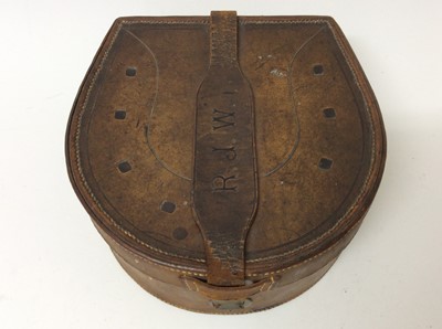 Lot 185 - Vintage leather collar box in the form of a horseshoe, the leather strap with period installs R.J.W., 21cm x 20cm