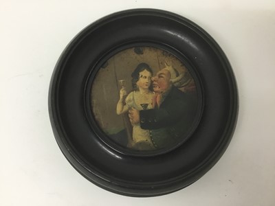 Lot 87 - Georgian lacquered painting of a gentleman attempting to seduce a woman, in an ebonised framed, the whole measuring 13cm diameter